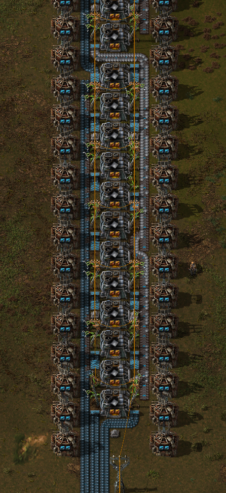 Bottom part of the 3 blue belt smelter array with modules and beacons