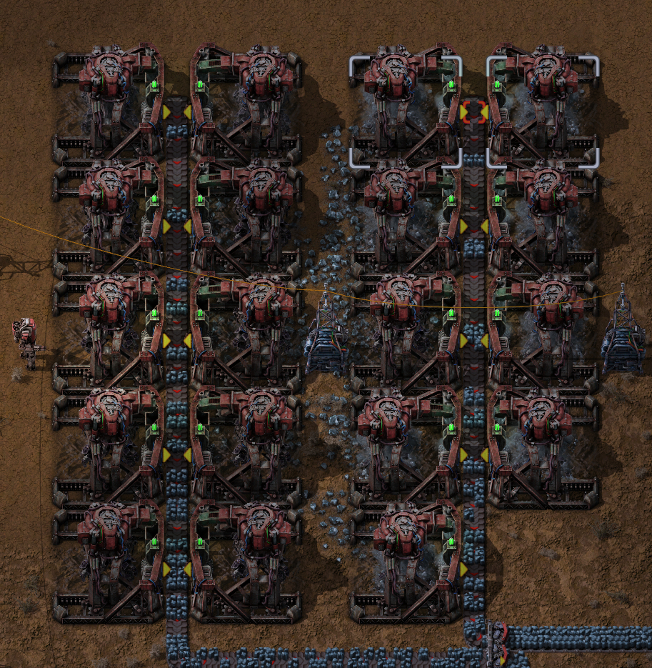 Screenshot about the big mining drills unable to fill up the red belt.