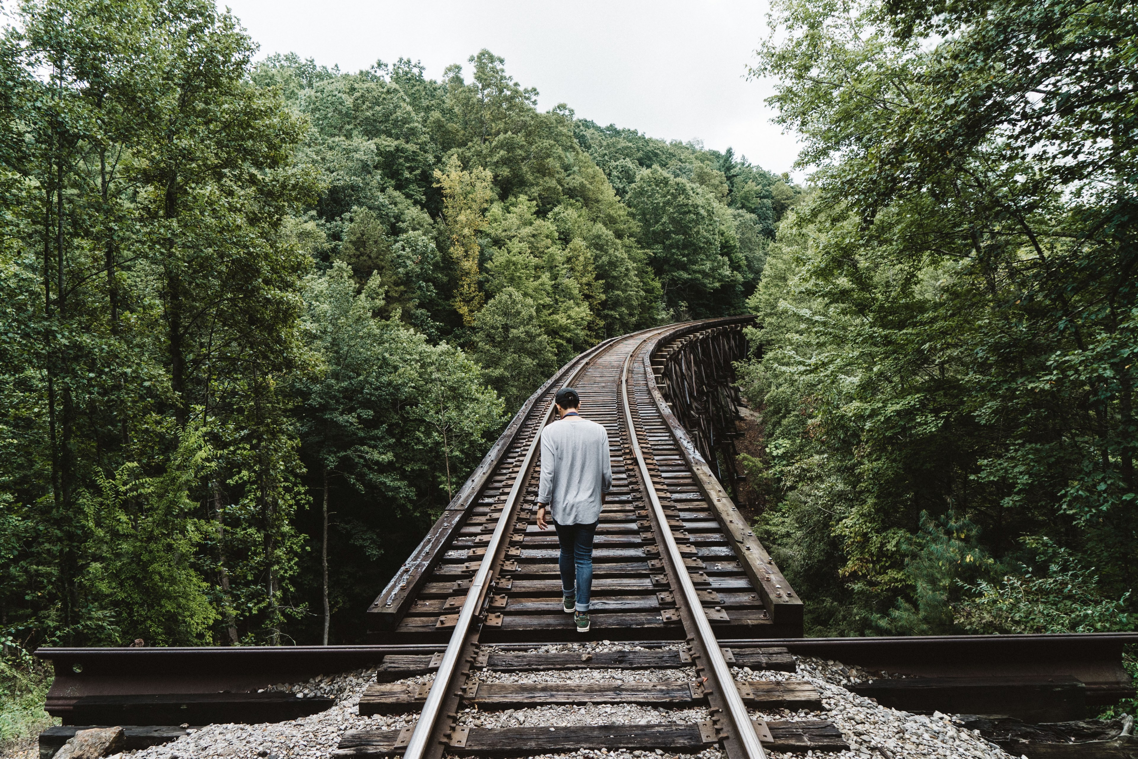 249108-a-man-walking-on-elevated-railroad-trackshigh-up-o.jpg